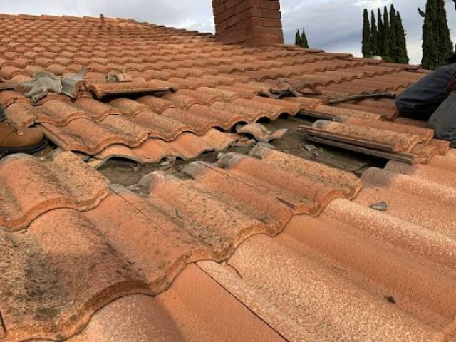 Tile Roof Being Repaired
